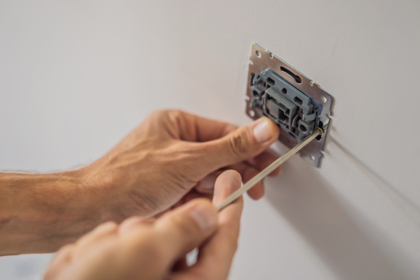 Installing a receptacle during electrical training