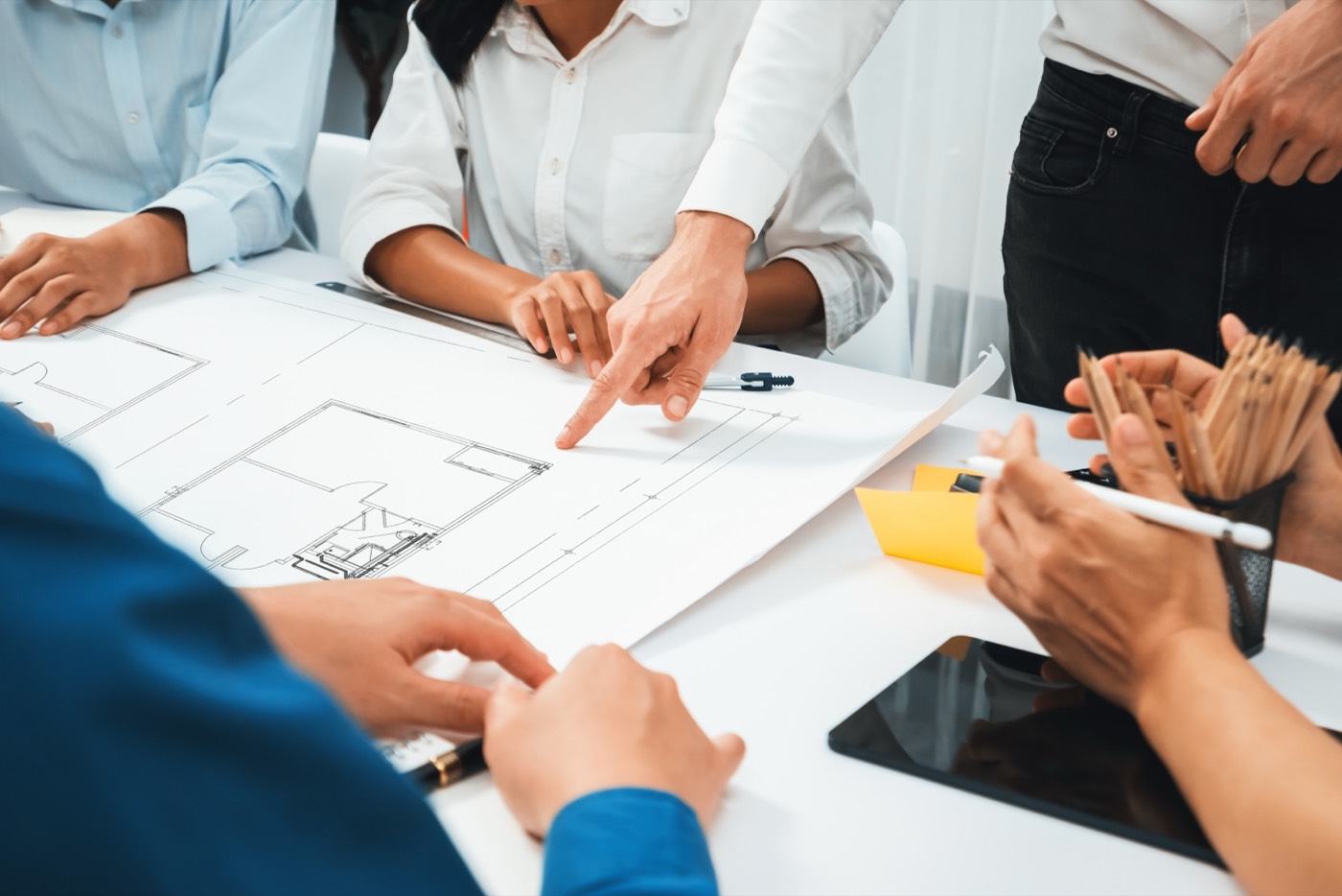 Contractors reviewing plans together